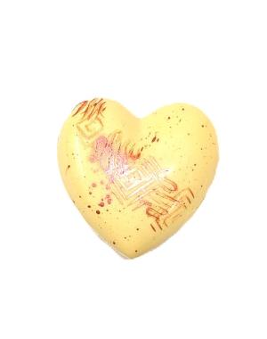 Coeur bonbonnière blanc garni de 11 chocolats